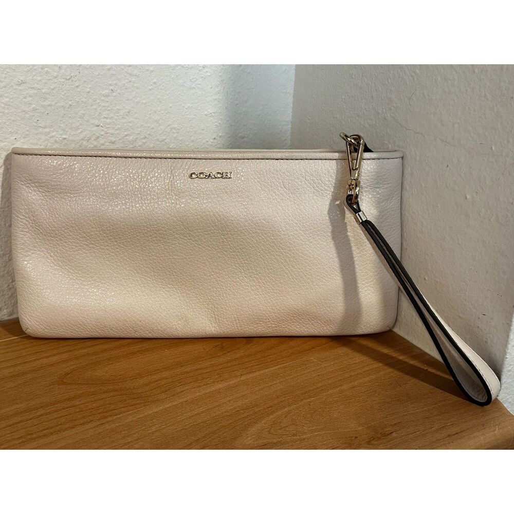 Coach Ivory Pebbled Leather Wristlet